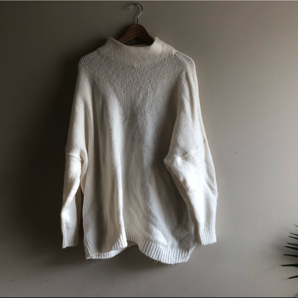 White turtleneck sweater